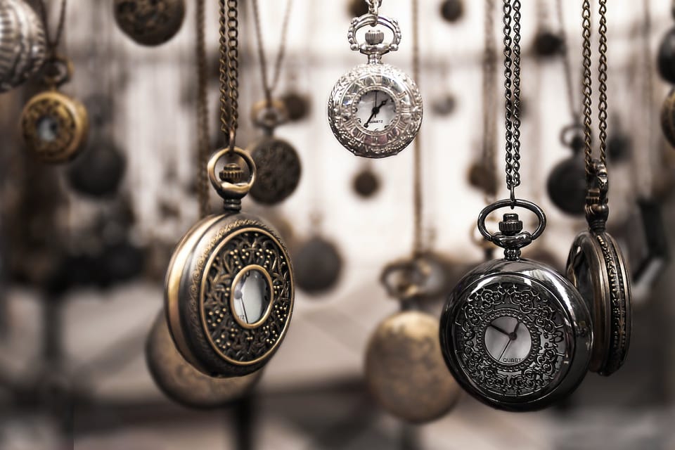 assorted silver colored pocket watch lot selective focus photo