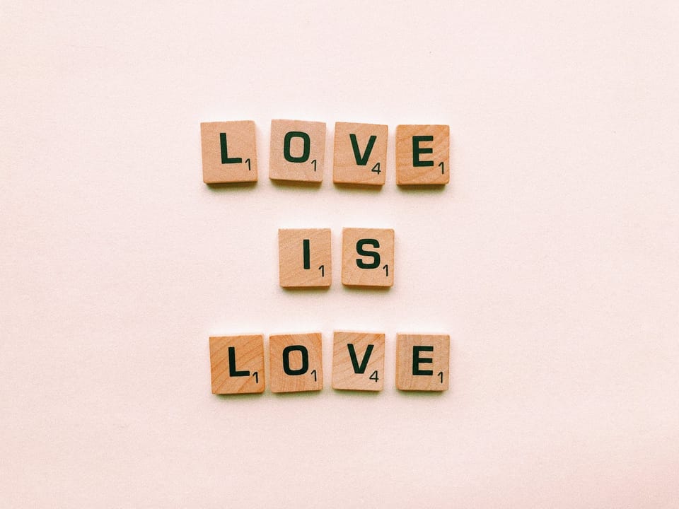 brown wooden love is lover decor