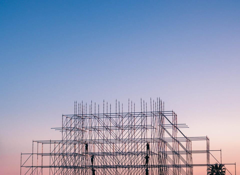 photo of people on building under construction